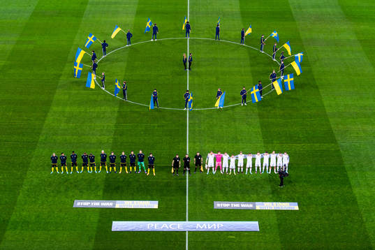 Players of Sweden participate in a manifestation against