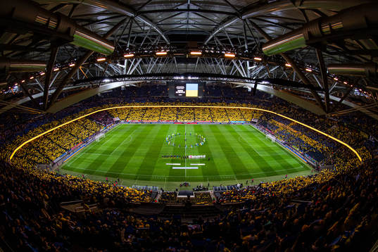 General view of Friends Arena with players of Sweden and of