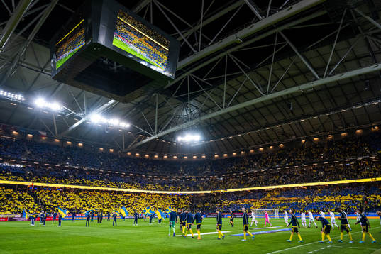 Players of Sweden enter the pitch