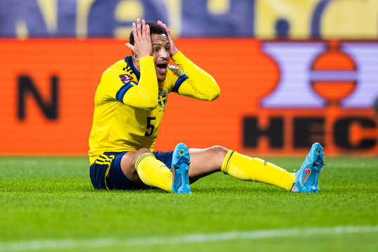 Martin Olsson of Sweden looks dejected