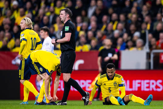 Martin Olsson of Sweden in pain
