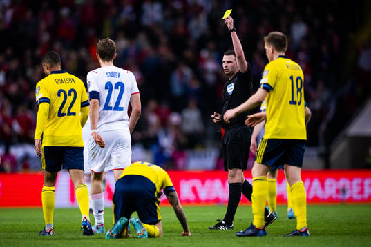 Tomas Soucek of Czech Republic receives a yellow card