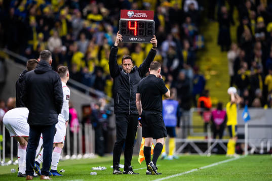 The fourth official shows four minutes of extra time