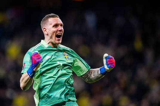 goalkeeper Robin Olsen of Sweden celebrates