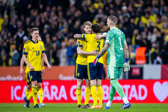 Filip Helander and Victor Lindelöf of Sweden celebrate