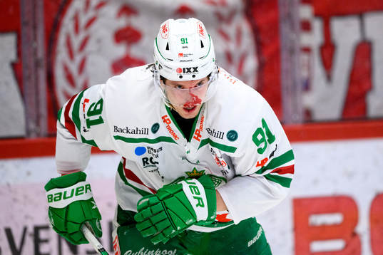Rögles Adam Tambellini med blod i ansiktet