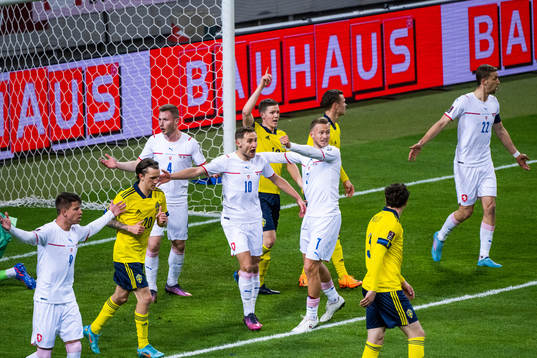 Jan Sykora and Antonin Barak of Czech Republic react