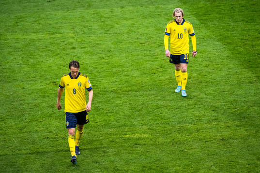 Albin Ekdal and Emil Forsberg of Sweden leave the pitch for