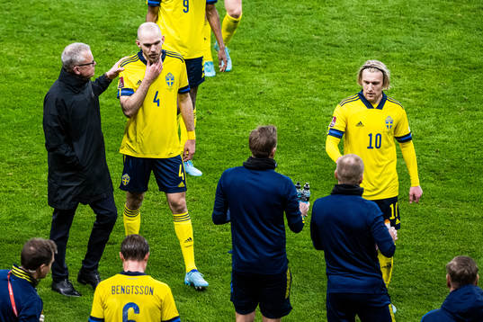 head coach Janne Andersson with Marcus Danielson and Emil