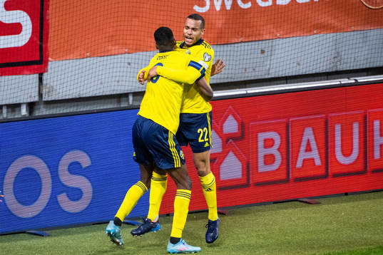 Alexander Isak and Robin Quaison of Sweden celebrates