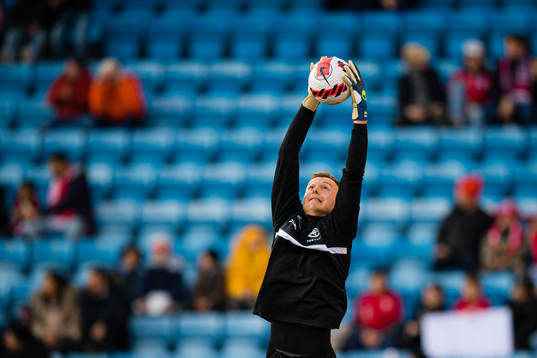 Marek Rodák of Slovakia warms up