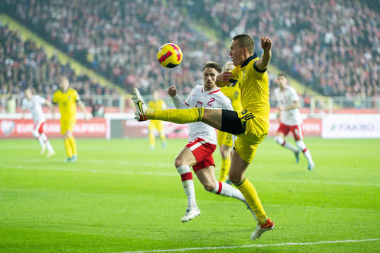 Matty Cash of Poland and Ludwig Augustinsson of Sweden