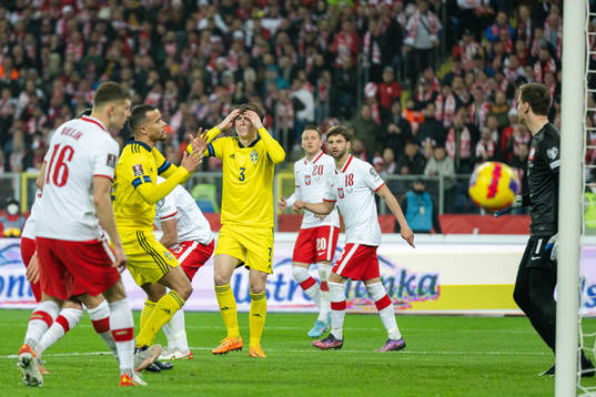 Robin Quaison and Victor Nilsson Lindelöf of Sweden look