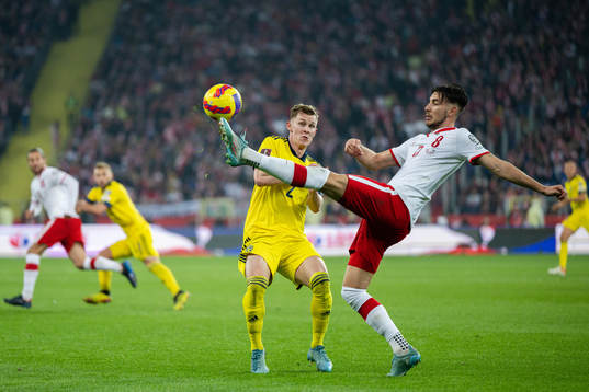 Emil Krafth of Sweden and Jakub Moder of Poland
