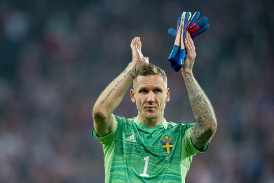 Goalkeeper Robin Olsen of Sweden looks dejected