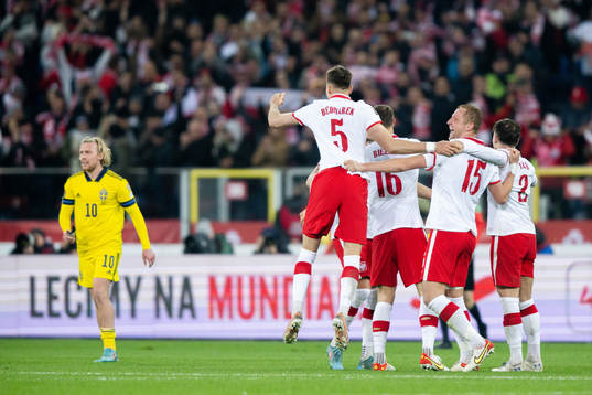 Players of Poland celebrate