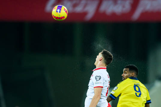 Jacek Goralski of Poland and Alexander Isak of Sweden