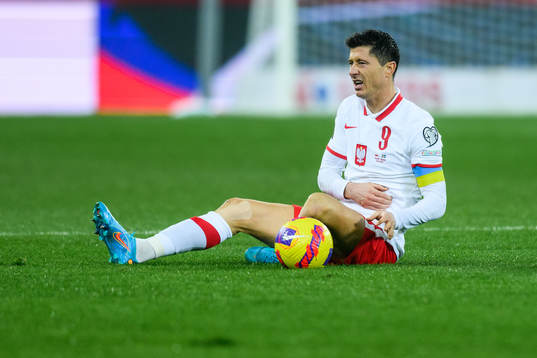 Robert Lewandowski of Poland in pain