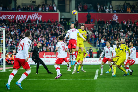 Robert Lewandowski of Poland and Victor Nilsson Lindelöf
