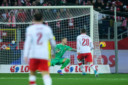 Piotr Zielinski of Poland scores 2-0 against goalkeeper