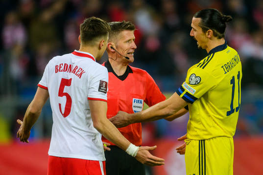 Jan Bednarek of Poland and Zlatan Ibrahimovic  of Sweden