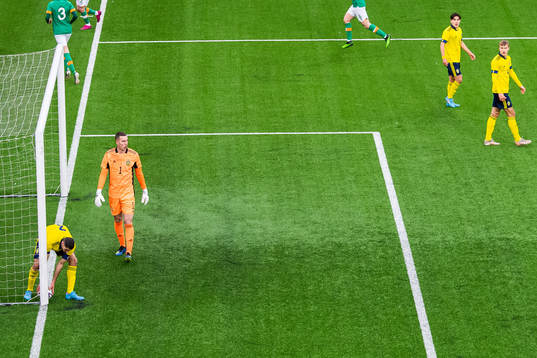 Aiham Ousou and goalkeeper Samuel Brolin of Sweden look