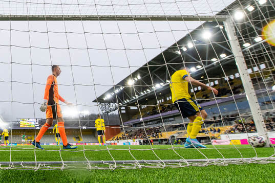 Aiham Ousou and goalkeeper Samuel Brolin of Sweden look