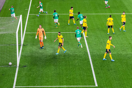 Aiham Ousou and goalkeeper Samuel Brolin of Sweden look