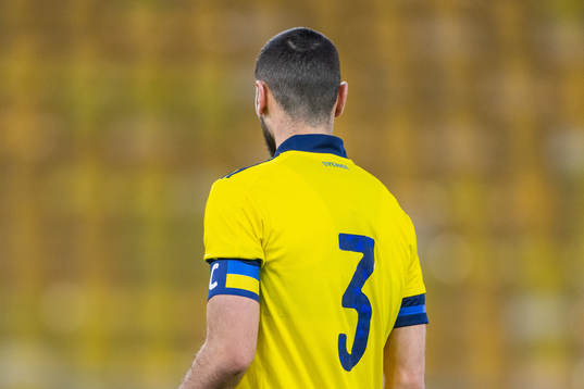 Aiham Ousou of Sweden with a captains armband in the colors