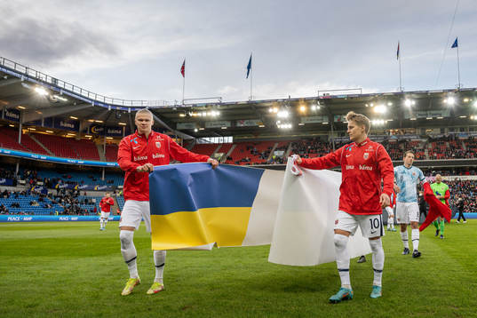 Erling Braut Haaland and Martin Ødegaard of Norway with a