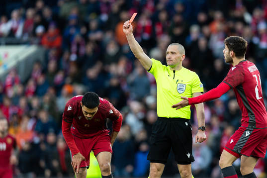Arman Hovhannisyan of Armenia receives a red card from