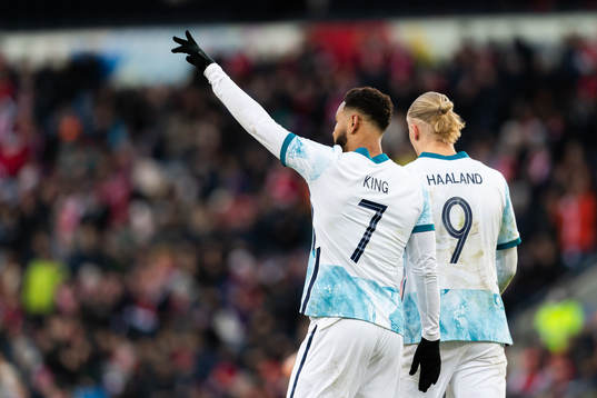Joshua King and Erling Braut Haaland of Norway celebrate