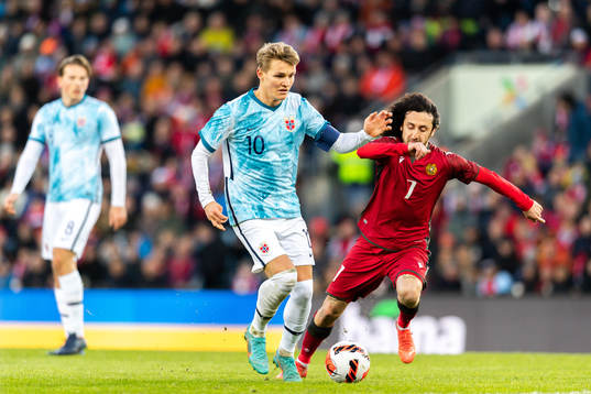 Martin Ødegaard of Norway and Khoren Bayramyan of