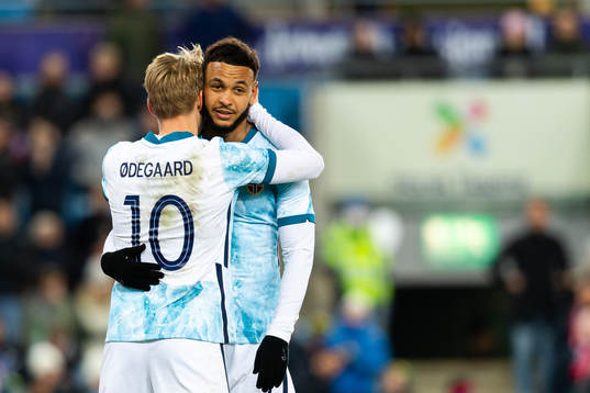 Martin Ødegaard and Joshua King of Norway celebrate the