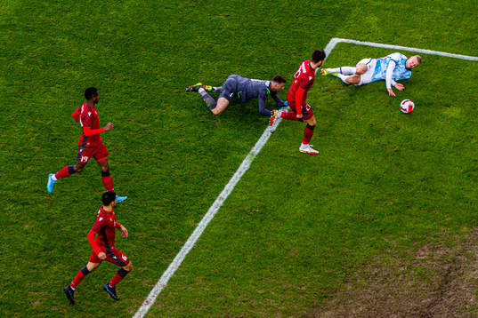 Erling Braut Haaland of Norway is brought down