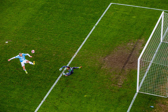 Erling Braut Haaland of Norway scores the 1-0 goal behind