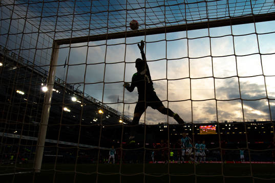 The silhouette of goalkeeper David Yurchenko of Armenia