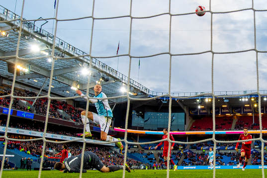 Erling Braut Haaland of Norway scores the 1-0 goal behind