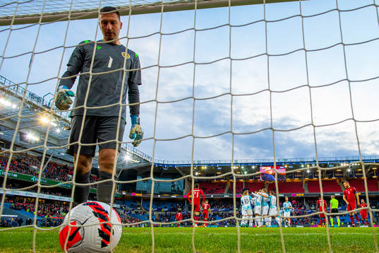 Goalkeeper David Yurchenko of Armenia looks dejected