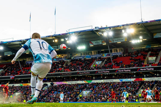 Martin Ødegaard of Norway takes a corner kick