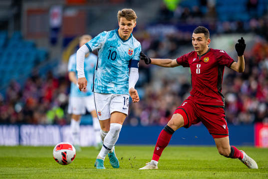 Martin Ødegaard of Norway and Eduard Spertsyan of Armenia