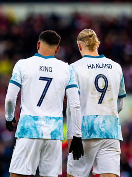 Joshua King and Erling Braut Haaland of Norway celebrate