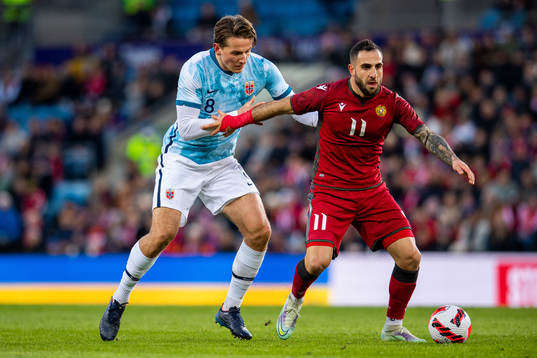 Sander Berge of Norway and Tigran Barseghyan of Armenia