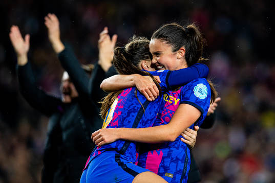 Ingrid Syrstad Engen and Claudia Pina of Barcelona celebrate