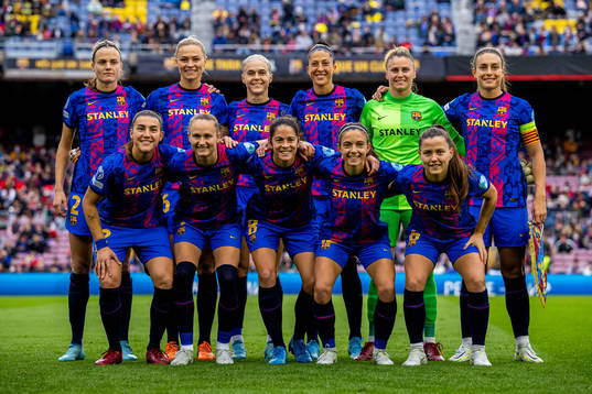 Players of Barcelona pose for a team photo