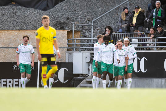 Kristian Eriksen and the players of HamKam celebrate