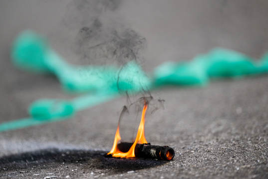 Remains of a flare is burning