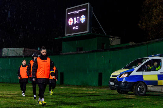 Players of Georgia leave the pitch in halftime