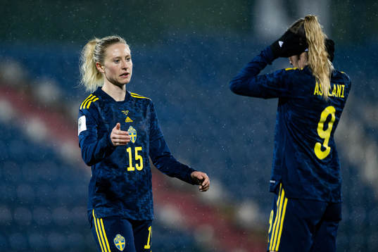 Rebecka Blomqvist and Kosovare Asllani of Sweden celebrate