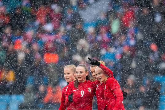 Ada Hegerberg of Norway celebrates with teammates Julie